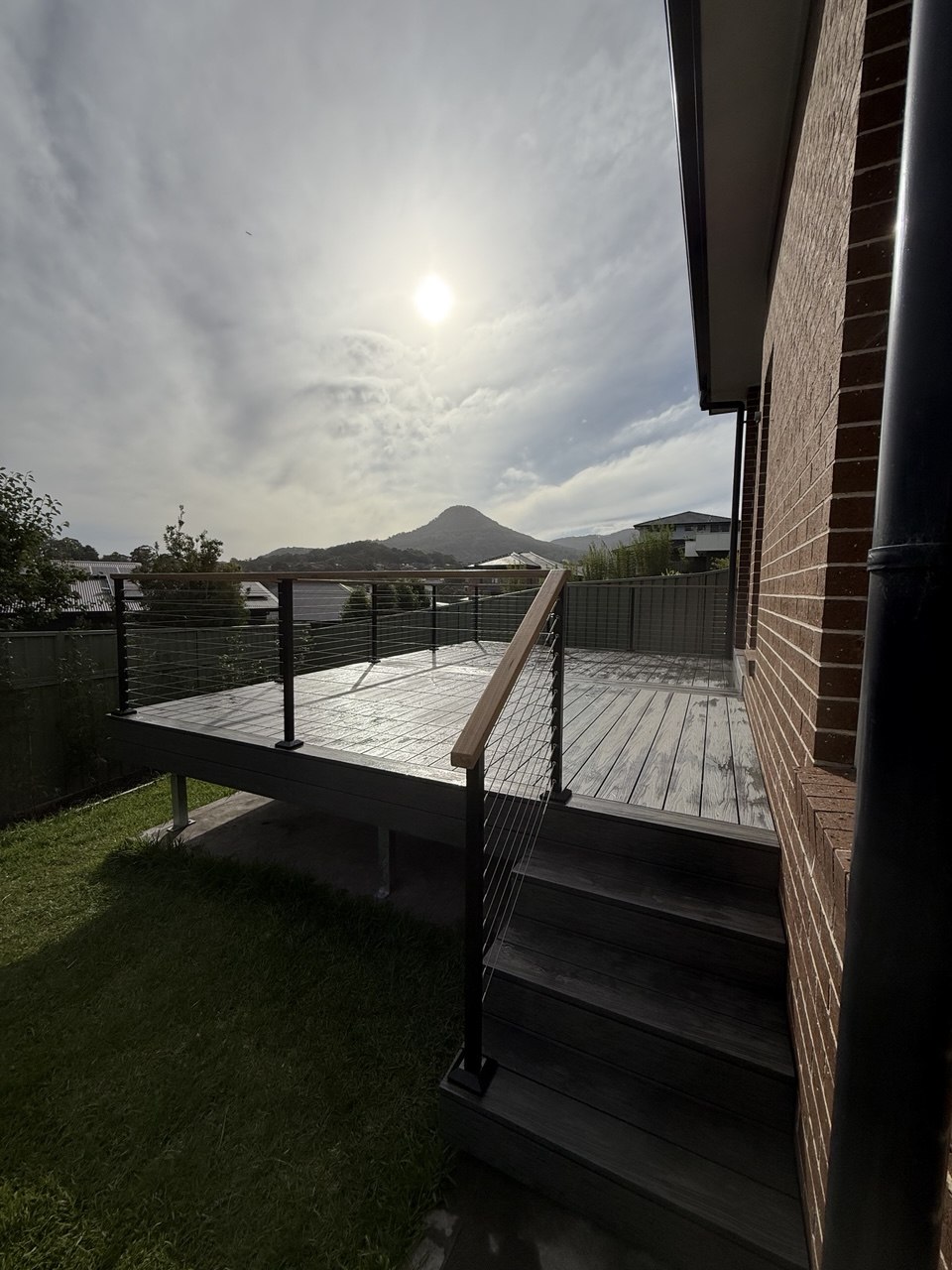 Raised EkoDeck with stainless wire balustrade and escarpment views in Figtree